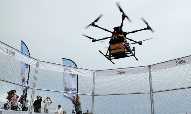 Drone delivers chicken to a beach