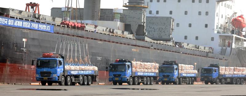 Food to be donated abroad is transported on April 17, 2024, on trucks at the port of Gunsan, Jeollabuk-do Province.